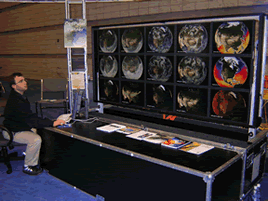 Eric Sokolowsky (GST, Inc.) of GSFC's SVS interactively views model and observation data (set 1) from NASA's Animated Earth project with hyperwall paradigm